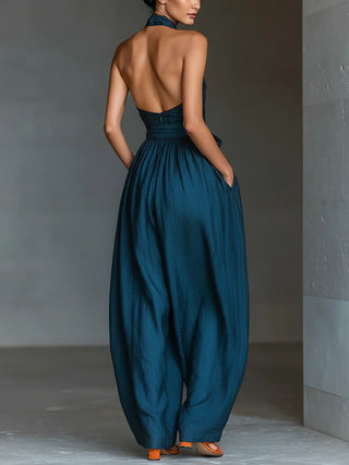Marineblauer Cross-Back Jumpsuit mit weitem Bein und praktischen Seitentaschen