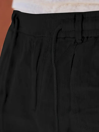 NICHOLS | Weite Leinenhose mit Kordelzug