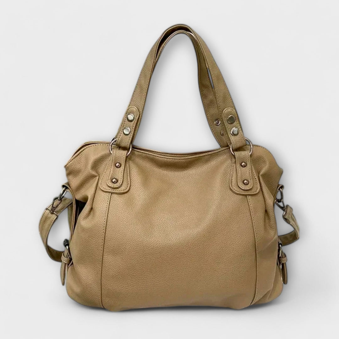 "Olivia - Elegante Hobo Schultertasche" can be rewritten as "Olivia - Stilvolle Hobo Schultertasche".