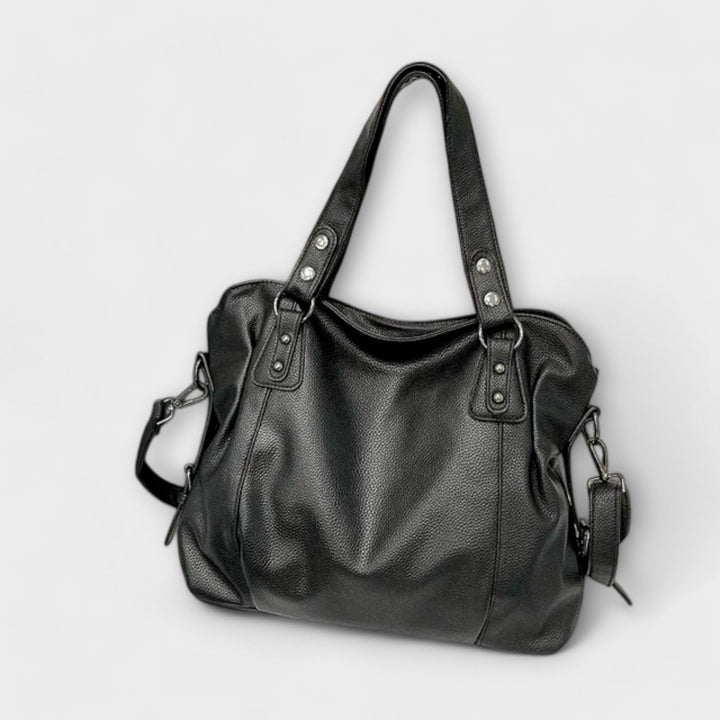 "Olivia - Elegante Hobo Schultertasche" can be rewritten as "Olivia - Stilvolle Hobo Schultertasche".