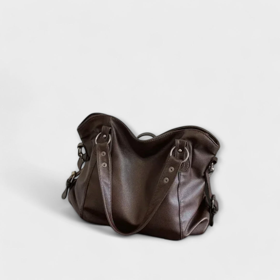 "Olivia - Elegante Hobo Schultertasche" can be rewritten as "Olivia - Stilvolle Hobo Schultertasche".