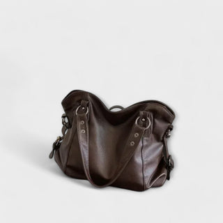 "Olivia - Elegante Hobo Schultertasche" can be rewritten as "Olivia - Stilvolle Hobo Schultertasche".