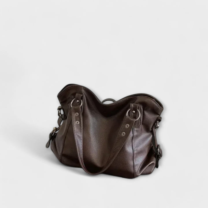 "Olivia - Elegante Hobo Schultertasche" can be rewritten as "Olivia - Stilvolle Hobo Schultertasche".