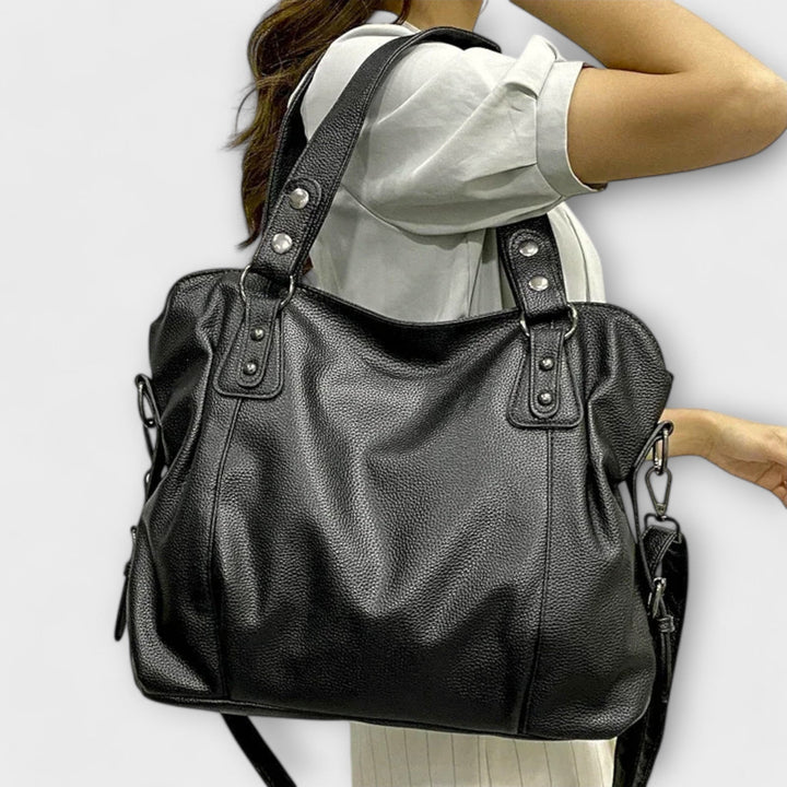 "Olivia - Elegante Hobo Schultertasche" can be rewritten as "Olivia - Stilvolle Hobo Schultertasche".