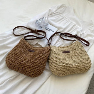 WEISS | Stroh Schultertasche" can be rewritten as "WEISS | Straw Shoulder Bag.