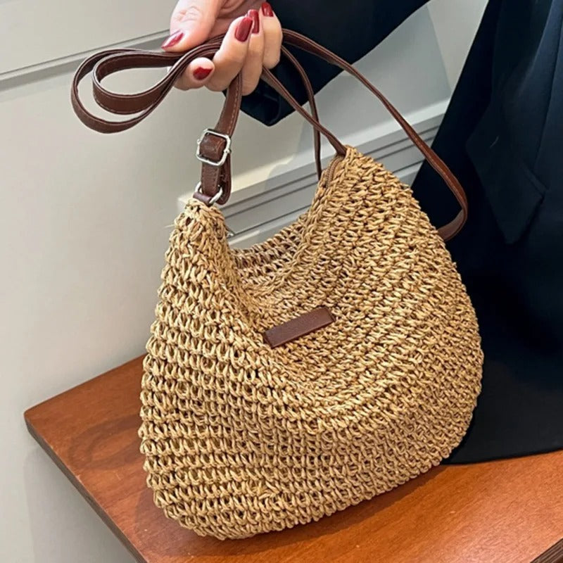 WEISS | Stroh Schultertasche" can be rewritten as "WEISS | Straw Shoulder Bag.