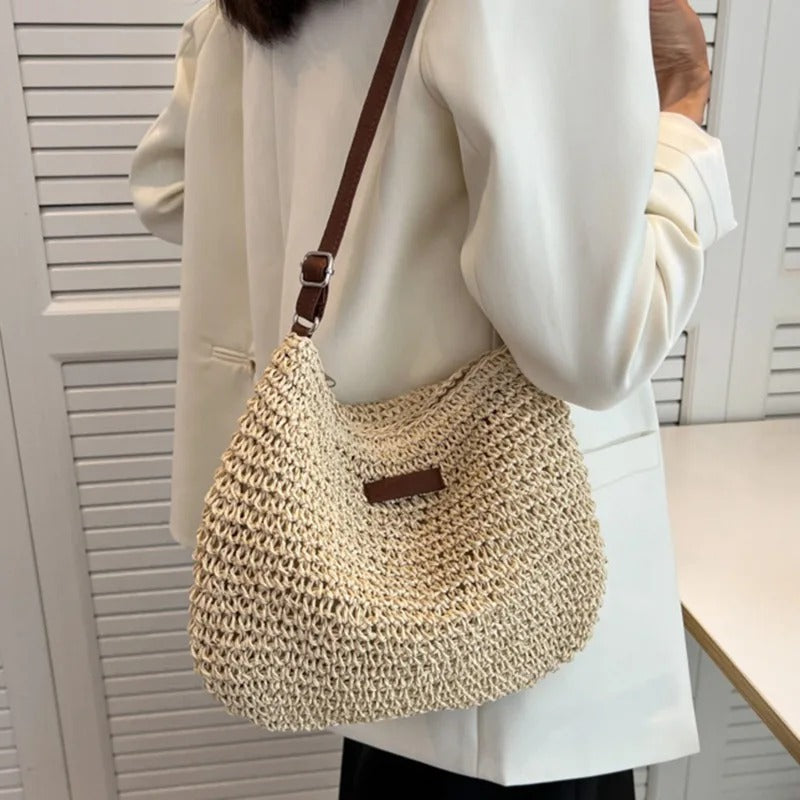 WEISS | Stroh Schultertasche" can be rewritten as "WEISS | Straw Shoulder Bag.