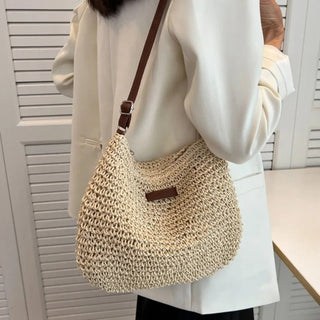 WEISS | Stroh Schultertasche" can be rewritten as "WEISS | Straw Shoulder Bag.
